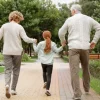 a grandparents enjoying with their grand doughtier